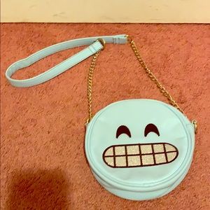 I’m selling this emoji purse
